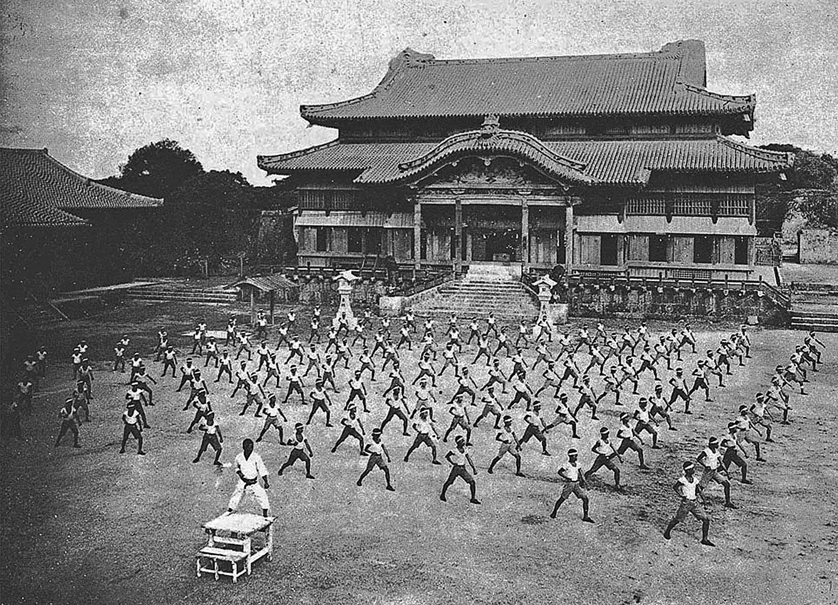 Karate training with Shinpan Gusukuma at Shuri Castle c. 1938, Okinawa Prefecture, Japan